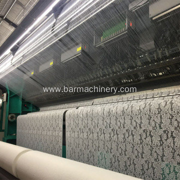 Computerized lace curtain warp knitting machine